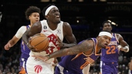 Toronto Raptors forward Pascal Siakam (43) drives past Phoenix Suns forward Torrey Craig (0) during the first half of an NBA basketball game, Monday, Jan. 30, 2023, in Phoenix. After seven seasons with the Toronto Raptors, Pascal Siakam is over trade deadline speculation.THE CANADIAN PRESS/AP, Rick Scuteri
