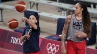 United States' Diana Taurasi, left, and Brittney Griner tale part in a women's basketball practice at the 2020 Summer Olympics, July 24, 2021, in Saitama, Japan. Taurasi’s USA Basketball career isn’t done just yet. The five-time Olympic gold medalist is part of the national team training camp in Minnesota next month. While Taurasi will be at the camp, Brittney Griner won’t. She is still part of the pool that the 2024 Olympic team will be chosen from. (AP Photo/Eric Gay, file)
