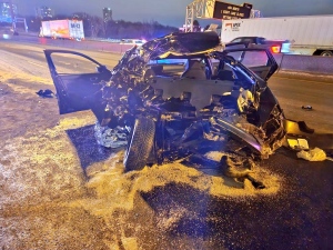 This photo shows Tuesday's overnight collision with a tractor trailer. (OPP via Twitter)