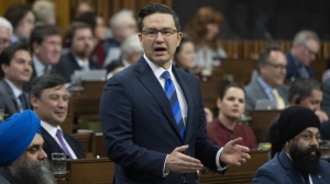 Conservative leader Pierre Poilievre rises during Question Period, Tuesday, February 7, 2023 in Ottawa. THE CANADIAN PRESS/Adrian Wyld