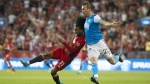 Charlotte FC defender Christian Fuchs (22) hauls down Toronto FC forward Jayden Nelson (11) to earn a red card during second half MLS action in Toronto on Saturday July 23, 2022. THE CANADIAN PRESS/Chris Young