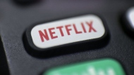 This Aug. 13, 2020 file photo shows a logo for Netflix on a remote control in Portland, Ore. THE CANADIAN PRESS/AP/Jenny Kane
