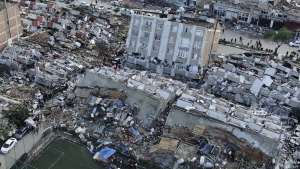 Aerial photo shows the destruction in Hatay city centre, southern Turkiye, Tuesday, Feb. 7, 2023. Donations are pouring into a Vancouver warehouse for those affected by Monday's devastating earthquake in Turkiye but a volunteer organizer says the country could most benefit from professional search and rescues teams. THE CANADIAN PRESS/AP
