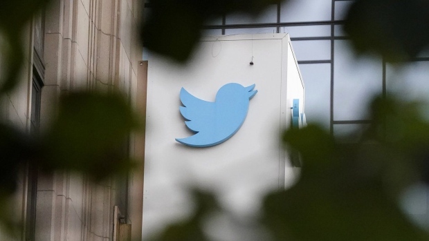 FILE - A sign at Twitter headquarters is shown in San Francisco, Dec. 8, 2022. Many Twitter users found themselves unable to tweet, follow accounts or access their direct messages on Wednesday, Feb. 8, 2023, as the Elon Musk-owned platform experienced a slew of widespread technical problems. (AP Photo/Jeff Chiu, File)