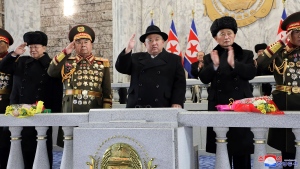 In this photo provided by the North Korean government, North Korean leader Kim Jong Un, center, attends a military parade to mark the 75th founding anniversary of the Korean People's Army on Kim Il Sung Square in Pyongyang, North Korea Wednesday, Feb. 8, 2023. Independent journalists were not given access to cover the event depicted in this image distributed by the North Korean government. The content of this image is as provided and cannot be independently verified. Korean language watermark on image as provided by source reads: "KCNA" which is the abbreviation for Korean Central News Agency. (Korean Central News Agency/Korea News Service via AP)