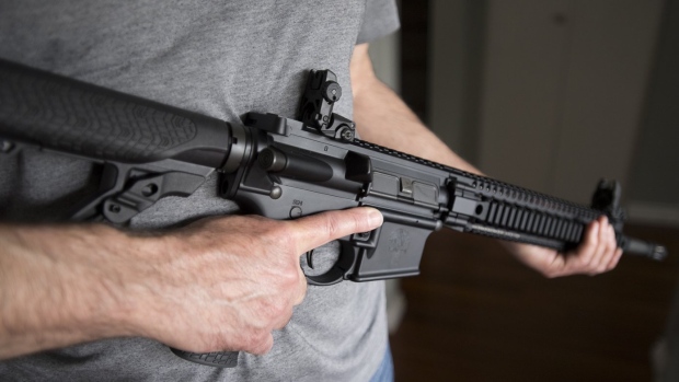 restricted gun licence holder holds a AR-15