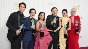 Harry Shum Jr., from left, Ke Huy Quan, Stephanie Hsu, Michelle Yeoh and Jamie Lee Curtis pose in the press room with the award for outstanding performance by a cast in a motion picture for "Everything Everywhere All at Once," at the 29th annual Screen Actors Guild Awards on Sunday, Feb. 26, 2023, at the Fairmont Century Plaza in Los Angeles. (Photo by Jordan Strauss/Invision/AP)