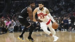 Toronto Raptors' Fred VanVleet (23) drives past Los Angeles Clippers' Terance Mann (14) during first half of an NBA basketball game Wednesday, March 8, 2023, in Los Angeles. (AP Photo/Jae C. Hong)