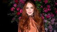 Lindsay Lohan appears the Christian Siriano Fall/Winter 2023 fashion show in New York on Feb. 9, 2023. (Photo by Charles Sykes/Invision/AP, File)