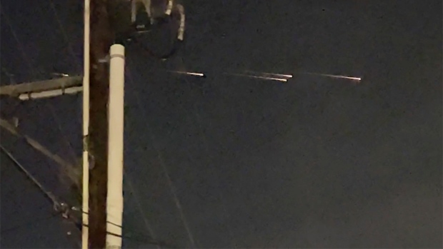This image from video provided by Jaime Hernandez shows streaks of light travelling across the sky over the Sacramento, Calif., area on Friday night, March 17, 2023. â€œMainly, we were in shock, but amazed that we got to witness it,â€ Hernandez said. "None of us had ever seen anything like it." (Jaime Hernandez via AP)