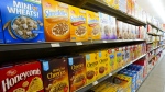 Cereals and cereal products are displayed for sale at a grocery store in Aylmer, Que., on Thursday, May 26, 2022. A new report that looks at the prevalence of marketing to children inside grocery stores and restaurants suggests regulation is needed to help reduce exposing kids to unhealthy foods.THE CANADIAN PRESS/Sean Kilpatrick