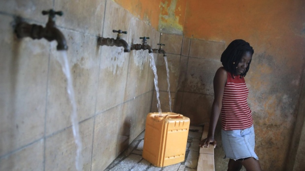 filling water jug Haiti