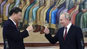 FILE - Russian President Vladimir Putin, right, and Chinese President Xi Jinping toast during their dinner at The Palace of the Facets, a building in the Moscow Kremlin, Russia, March 21, 2023. China’s leader Xi just concluded his three-day visit with Russian President Putin, a warm affair in which the two men praised each other and spoke of a profound friendship. It’s a high in a complicated, centuries-long relationship in which the two countries have been allies and enemies. (Pavel Byrkin, Sputnik, Kremlin Pool Photo via AP, File)