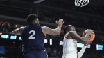 Texas' Marcus Carr drives by Penn State's Myles Dread during the second half of a second-round college basketball game in the NCAA Tournament Saturday, March 18, 2023, in Des Moines, Iowa. (AP Photo/Morry Gash)
