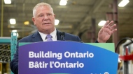 Ontario Premier Doug Ford speaks after touring the Oakville Stamping and Bending Limited facility in Oakville, Ont., on Wednesday, March 22, 2023. THE CANADIAN PRESS/Nathan Denette 