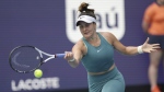 Bianca Andreescu, of Canada, returns a volley from Emma Raducanu, of Great Britain, in the first set of a match at the Miami Open tennis tournament, Wednesday, March 22, 2023, in Miami Gardens, Fla. THE CANADIAN PRESS/AP-Jim Rassol