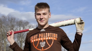 East Palestine High School senior Owen Elliott poses for a portrait, Monday, March 6, 2023, in East Palestine, Ohio. Athletes are navigating spring sports following the Feb. 3 Norfolk Southern freight train derailment. (AP Photo/Matt Freed)