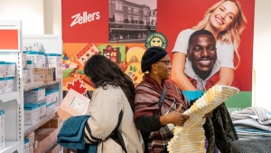 Shoppers wander through a newly-opened Zellers store in Scarborough Town Centre Mall, in Scarborough, Ont., on Thursday, March 23, 2023. THE CANADIAN PRESS/Chris Young 