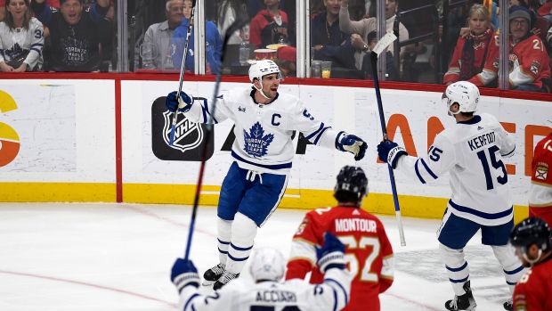 Toronto Maple Leafs center John Tavares reacts to scoring a goal during the third period of an NHL hockey game against the Florida Panthers, Thursday, March 23, 2023, in Sunrise, Fla. (AP Photo/Michael Laughlin)