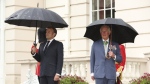 FILE - Britain's Prince Charles welcomes French president Emmanuel Macron, left, to Clarence House in London, Thursday June 18, 2020. French President Emmanuel Macron’s office on Friday, March 24, 2023, said a state visit by Britain’s King Charles III has been postponed amid mass strikes and protests in France. The king had been scheduled to arrive in France on Sunday on his first state visit as monarch, before heading to Germany on Wednesday. (Jonathan Brady/Pool via AP, File)