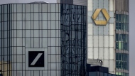 The headquarters of the German banks, Deutsche Bank, left, and Commerzbank are pictured in Frankfurt, Germany, Friday, March 17, 2023. (AP Photo/Michael Probst)