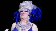 In this Sept. 2019 photo, Darcelle XV, performs in Portland, Ore. Walter C. Cole, better known as the iconic drag queen who performed for decades as Darcelle, has died of natural causes in Portland, Ore, on Thursday, March 24, 2023. (Beth Nakamura/The Oregonian via AP)