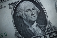 The likeness of George Washington is seen on a U.S. one dollar bill, Monday, March 13, 2023, in Marple Township, Pa. (AP Photo/Matt Slocum)
