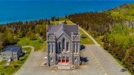 An aerial photo of St. Bernard Roman Catholic Church in St. Bernard, N.S., on the province’s southwestern coast, is seen in an undated handout photo. The deconsecrated church is being sold for an asking price of $250,000, though it will require extensive repairs, says the former church treasurer, Suzanne Lefort. THE CANADIAN PRESS/HO-Travis Baker