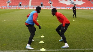 Jonathan David (left) and Alphonso Davies take part in a drill Monday, March 27, 2023 at Canada’s training session at BMO Field in Toronto. The Canadian men play Honduras in CONCACAF Nations League play Tuesday. THE CANADIAN PRESS/Neil Davidson