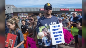Nick Beaton, whose wife Kristen Beaton was killed in the April mass shooting, attends a march organized by families of victims demanding an inquiry, in Bible Hill, N.S., Wednesday, July 22, 2020. Beaton and the others who lobbied for the inquiry, will see the result of their demands for a full account of what happened, as the inquiry delivers its recommendations for reforms in a 2000-3000 page, seven-volume report. THE CANADIAN PRESS/Andrew Vaughan