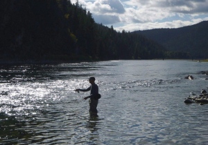 A fly fisherman casts on the Kootenai River, downstream of the Koocanusa Reservoir at the centre of the dispute, near the Montana-Idaho border and Leonia, Idaho, on Sept. 19, 2014. U.S. Indigenous leaders say they aren’t about to stop pushing Canada to agree to a bilateral investigation into toxing mining runoff from B.C. THE CANADIAN PRESS/AP