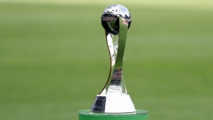 FILE - A view of the trophy displayed on the pitch prior to the final match between Ukraine and South Korea at the U20 World Cup soccer, in Lodz, Poland, Saturday, June 15, 2019. Indonesia has been stripped of hosting the men's Under-20 World Cup amid political turmoil regarding Israel’s participation. FIFA says Indonesia is not ready to stage the 24-team tournament scheduled to start on May 20, 2023. The decision comes after a meeting in Doha between FIFA president Gianni Infantino and Indonesian soccer federation president Erick Thohir. (AP Photo/Sergei Grits, File)