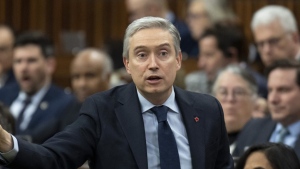 Innovation, Science and Industry Minister Francois-Philippe Champagne rises during Question Period, Wednesday, March 29, 2023 in Ottawa. THE CANADIAN PRESS/Adrian Wyld