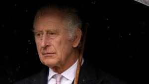 Britain's King Charles III arrives to lay a wreath of flowers at St. Nikolai Memorial in Hamburg, Germany, Friday, March 31, 2023. King Charles III arrived Wednesday for a three-day official visit to Germany. (AP Photo/Matthias Schrader)