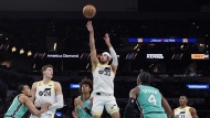 Utah Jazz guard Johnny Juzang (33) shoots against the San Antonio Spurs during the second half of an NBA basketball game in San Antonio, Wednesday, March 29, 2023. (AP Photo/Eric Gay)