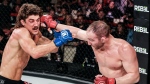Canadian middleweight Aaron Jeffery (left) absorbs a blow from American John Salter at Bellator 293 on March 31, 2023. THE CANADIAN PRESS/HO-BELLATOR MMA/LUCAS NOONAN