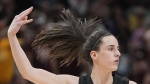 Caitlin Clark tossed the ball high in the air as the clock ticked down, gave a huge shout-out to her adoring fans and then took off on a gleeful gallop around the court.
