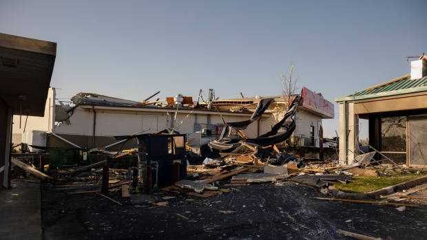 Businesses are damaged from a storm in Little Rock, Ark., on Saturday, April 1, 2023. Unrelenting tornadoes that tore through parts of the South and Midwest that shredded homes and shopping centers. (AP Photo/Sha'Cori Washington)