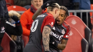 Toronto FC forward Federico Bernardeschi (10) celebrates his goal against Charlotte FC with teammate midfielder Jahkeele Marshall-Rutty (7) during first half MLS soccer action in Toronto, on Saturday, April 1, 2023. THE CANADIAN PRESS/Andrew Lahodynskyj