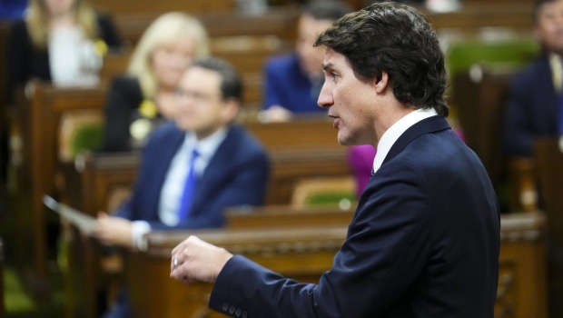 The Liberals have put forward legislation that aims to make good on their pledge to tighten passenger rights rules after a year pocked by travel chaos and a ballooning complaints backlog. Prime Minister Justin Trudeau rises during question period in the House of Commons on Parliament Hill in Ottawa on Tuesday, April 18, 2023. THE CANADIAN PRESS/Sean Kilpatrick