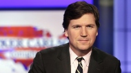FILE - Tucker Carlson, host of "Tucker Carlson Tonight," poses for photos in a Fox News Channel studio on March 2, 2017, in New York. Fox News says it has agreed to part ways with Tucker Carlson, less than a week after settling a lawsuit over the network’s 2020 election reporting. The network said in a press release Monday that the popular and controversial prime-time host's last program aired on Friday. (AP Photo/Richard Drew, File)