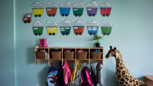 Children's backpacks and shoes are seen at a daycare franchise, in Langley, B.C., on May 29, 2018. Statistics Canada launched a searchable database of popular baby names Tuesday, revealing Noah and Olivia as the top monikers of 2021.THE CANADIAN PRESS/Darryl Dyck
