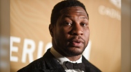 Jonathan Majors arrives at the American Black Film Festival Honors on March 5, 2023, at 1 Hotel in West Hollywood, Calif. Majors was confronted Tuesday, May 9, with a revised domestic violence charge stemming from a womanâ€™s allegations that the Marvel star twisted her arm, struck her head and shoved her into a vehicle in New York City in March. (Photo by Richard Shotwell/Invision/AP, File)