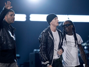 From left, Drake, Eminem, and Lil Wayne perform at the Grammy Awards on Sunday, Jan. 31, 2010, in Los Angeles. (AP Photo/Matt Sayles)