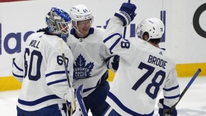 Toronto Maple Leafs goaltender Joseph Woll (60) celebrates with center David Kampf (64) and defenceman TJ Brodie (78) after the team's over the Florida Panthers in Game 4 of an NHL hockey Stanley Cup second-round playoff series Wednesday, May 10, 2023, in Sunrise, Fla. Woll is in line to get the nod in another must-win moment THE CANADIAN PRESS/AP-Lynne Sladky