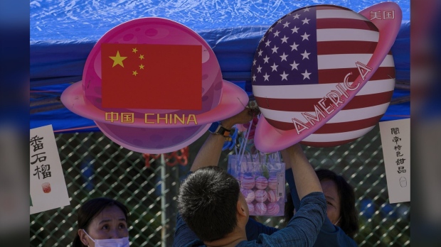 booth displaying China and American flags