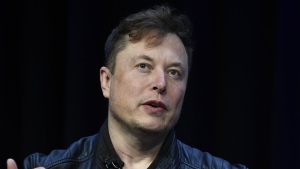 FILE - Tesla and SpaceX CEO Elon Musk speaks at the SATELLITE Conference and Exhibition, March 9, 2020, in Washington. Musk on Tuesday, May 16, 2023, dismissed speculation that he might step down as Tesla's CEO and told the company’s annual shareholders meeting that the the electric car and solar panel company would start doing a small amount of advertising. (AP Photo/Susan Walsh, File)