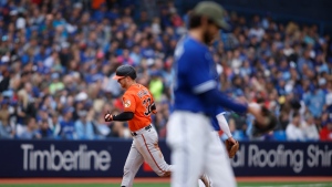 Baltimore Orioles first baseman Ryan O'Hearn (32) runs out a three-run home run in eighth inning MLB American League baseball action against the Toronto Blue Jays in Toronto on Saturday, May 20, 2023. THE CANADIAN PRESS/Cole Burston 