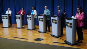 Toronto mayoral candidates Josh Matlow, left to right, Olivia Chow, Mitzi Hunter, Brad Bradford, Mark Saunders and Ana Bailão take the stage at a mayoral debate in Scarborough, Ont. on Wednesday, May 24, 2023. THE CANADIAN PRESS/Chris Young