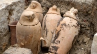 Canopic jars, which were made to contain organs that were removed from the body in the process of mummification, are seen at the site of the Step Pyramid of Djoser in Saqqara, 24 kilometers (15 miles) southwest of Cairo, Egypt, Saturday, May 27, 2023. Saqqara is a part of Egypt's ancient capital of Memphis, a UNESCO World Heritage site. (AP Photo/Amr Nabil)